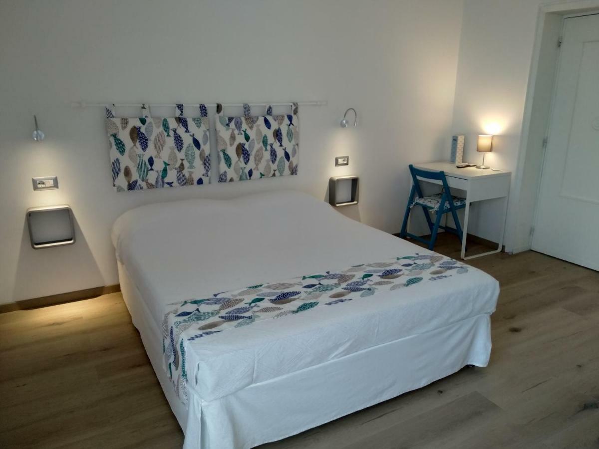 Omphalos Hotel Alghero Bagian luar foto